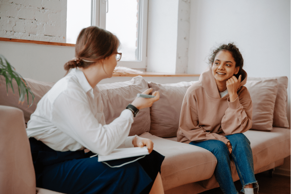 2 woman talking about affordable mental health care